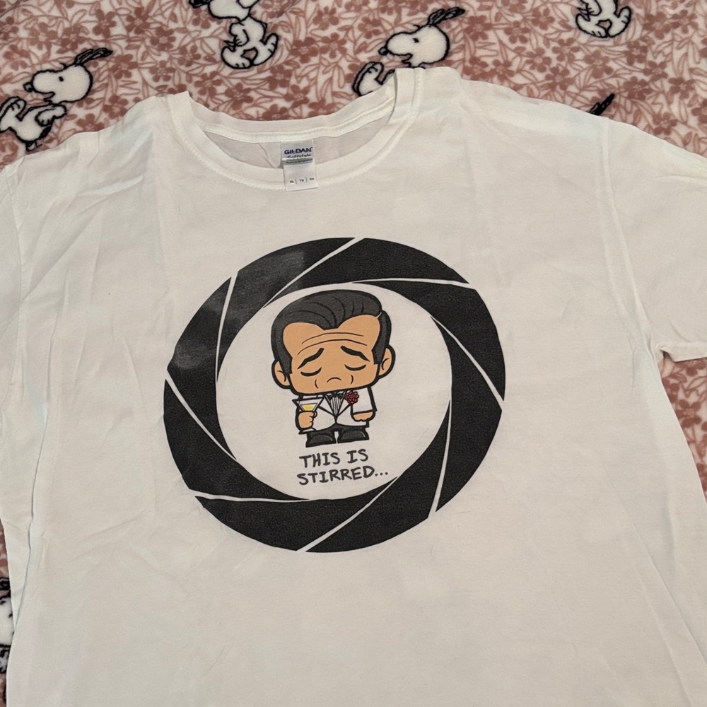 Gildan White Short-Sleeve Graphic Tee with Black and Tan Cartoon Spy